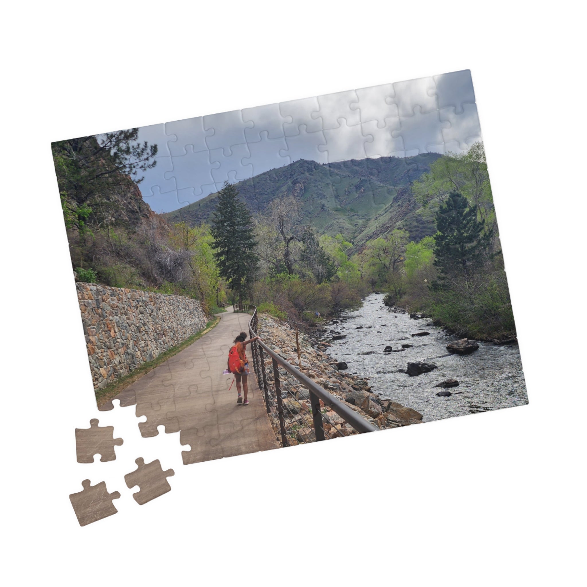 Puzzle - Girl Walking Along Clear Creek in Golden CO in Spring